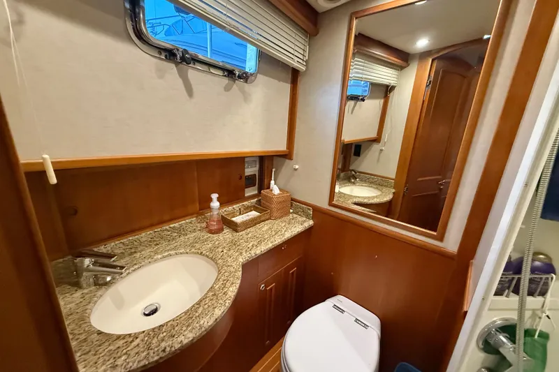 Slide: The Image of Luxurious bathroom in 2009 Grand Banks 47 Heritage EU yacht with granite countertop. - 58