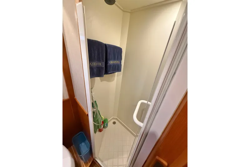 Slide: The Image of Shower area in 2009 Grand Banks 47 Heritage EU yacht with towels and toiletries. - 60