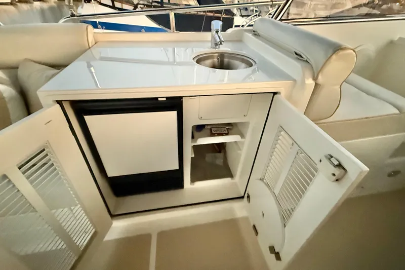 Slide: The Image of 2009 Grand Banks 47 Heritage EU yacht interior with sink and storage cabinet. - 71
