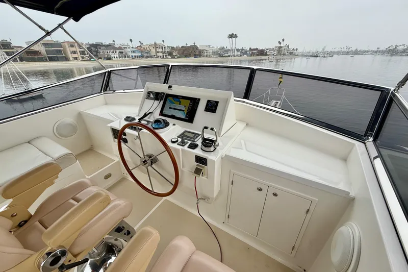 Slide: The Image of Flybridge of 2009 Grand Banks 47 Heritage EU yacht with steering wheel and navigation equipment. - 74
