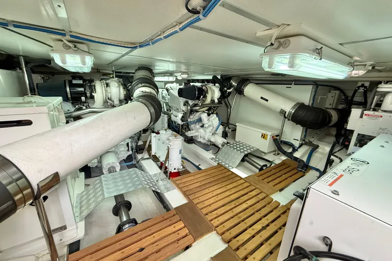 Slide: The Image of Engine room of 2009 Grand Banks 47 Heritage EU yacht, featuring mechanical components and piping. - 88