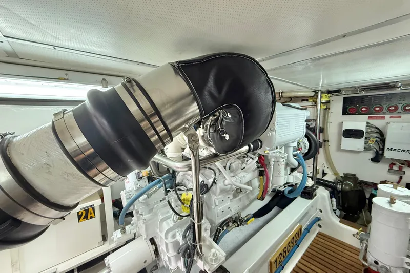 Slide: The Image of Engine room of 2009 Grand Banks 47 Heritage EU yacht, showcasing detailed machinery and components. - 92