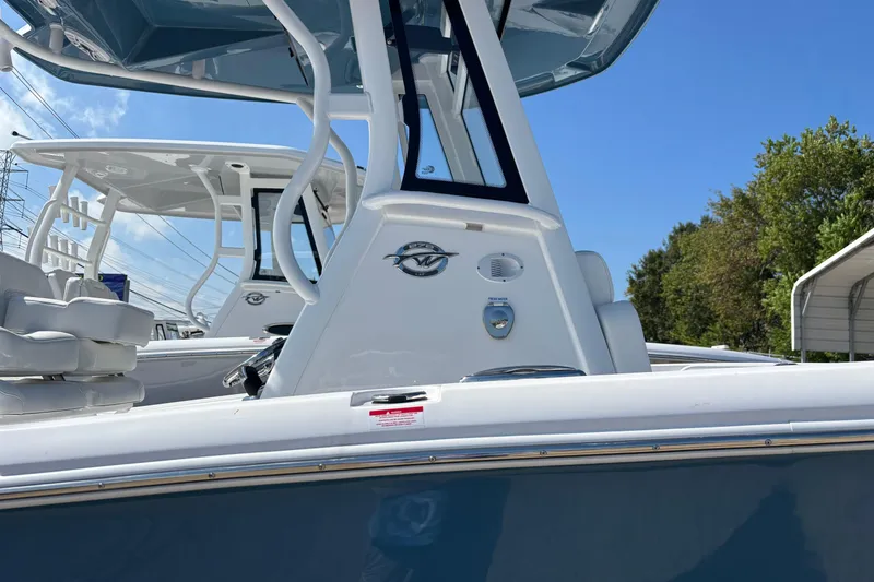 Slide: The Image of 2026 Tidewater 272 LXF boat with sleek design and modern features. - 2
