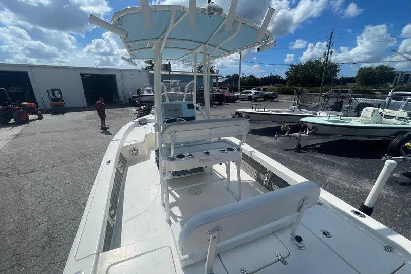 Slide: The Image of 2020 Pathfinder 2200 Tournament Edition boat in a sunny outdoor setting. - 12