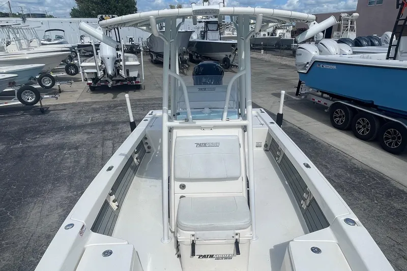 Slide: The Image of 2020 Pathfinder 2200 Tournament Edition boat in a marina, showcasing seating and console. - 9