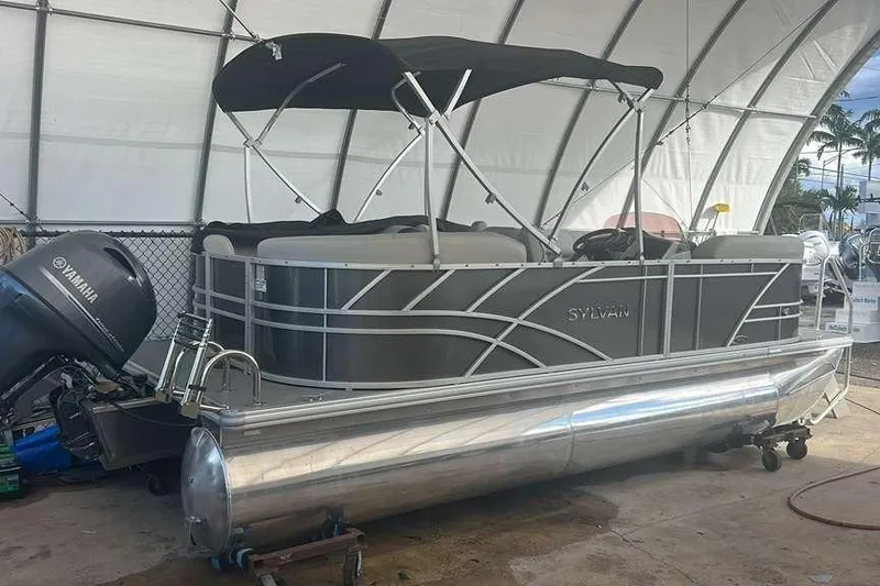 Slide: The Image of 2023 Sylvan Mirage 820 LZ pontoon boat with Yamaha engine in storage. - 3