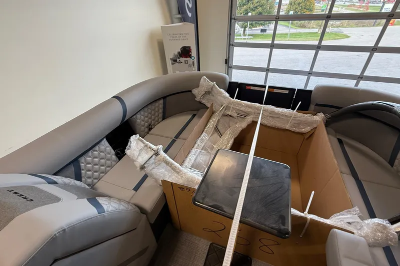 Slide: The Image of 2026 Crest Conquest 230 SLSC boat interior with wrapped components and seating. - 16