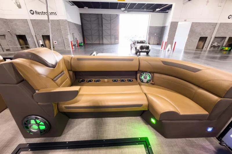 Slide: The Image of Luxurious interior of 2026 Montara Surf Boss EVO SL 23' with plush seating and modern design. - 9