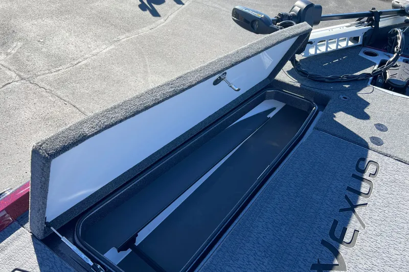 Slide: The Image of Open storage compartment on 2026 Vexus VXS20 boat, showcasing interior design and functionality. - 10