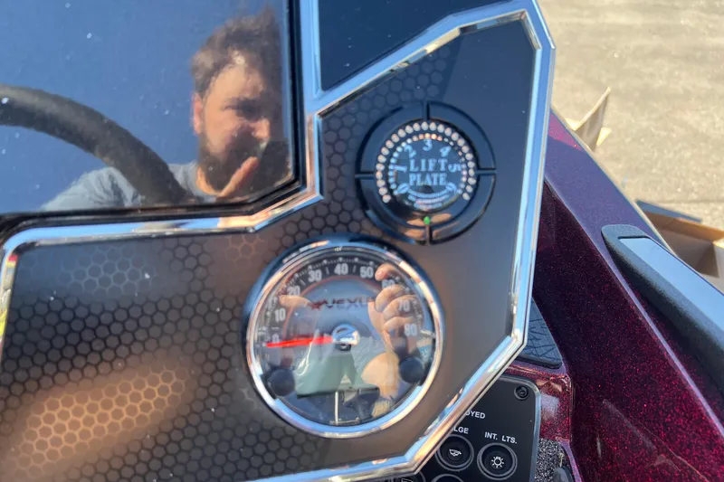 Slide: The Image of Dashboard of a 2026 Vexus VXS20 boat with lift plate and speedometer. - 14