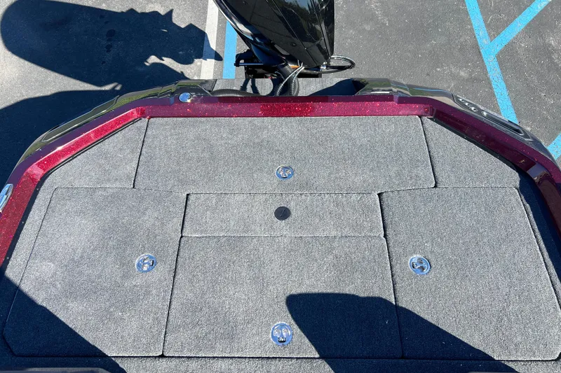 Slide: The Image of 2026 Vexus VXS20 boat deck with carpeted surface and storage compartments. - 20