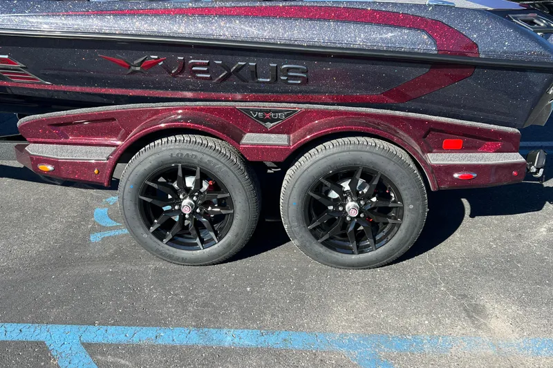 Slide: The Image of 2026 Vexus VXS20 boat trailer with black alloy wheels and sparkling maroon finish. - 4