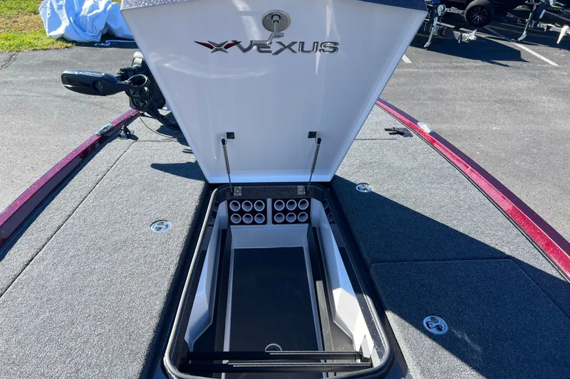 Slide: The Image of Open storage compartment on 2026 Vexus VXS20 boat, showcasing organized interior layout. - 8
