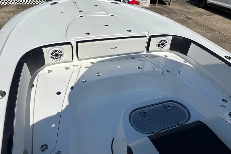 Slide: The Image of Interior view of 2026 Tidewater 2700 Carolina Bay boat, showcasing dashboard and windshield. - 14