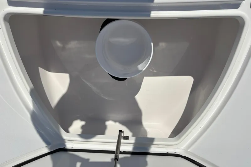 Slide: The Image of 2026 Tidewater 2700 Carolina Bay boat interior with sleek seating and modern design. - 16