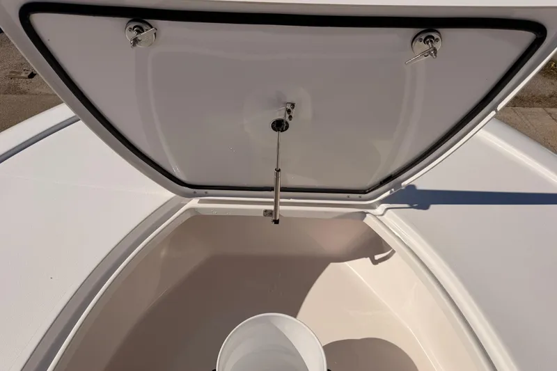 Slide: The Image of Open storage compartment on 2026 Tidewater 2700 Carolina Bay boat. - 17