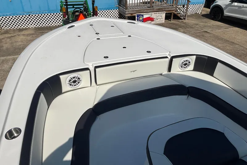 Slide: The Image of 2026 Tidewater 2700 Carolina Bay with dual 300 V6 engines at a dealership. - 8