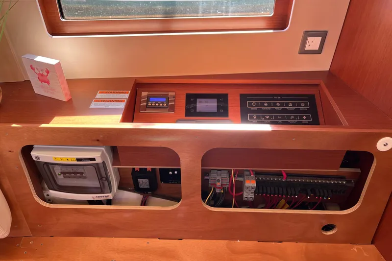 Slide: The Image of Control panel and electrical system of 2020 Beneteau Oceanis 46.1 yacht interior. - 52