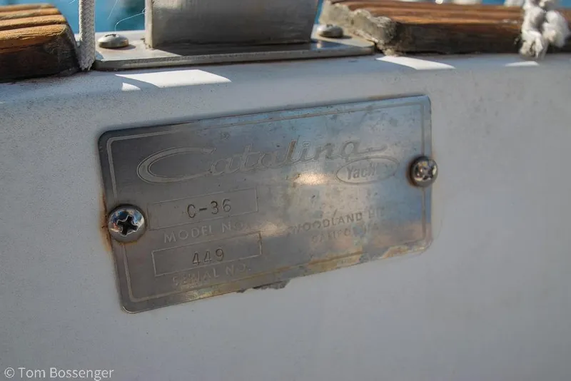 Slide: The Image of Metal nameplate on 1985 Catalina 36 sailboat, displaying model and serial numbers. - 26