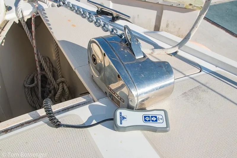 Slide: The Image of Anchor windlass on 1985 Catalina 36 sailboat deck with control remote. - 39