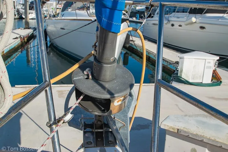 Slide: The Image of Bow of 1985 Catalina 36 sailboat with anchor and marina view. - 40