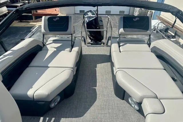 Slide: The Image of 2026 Barletta C22M boat interior with plush seating and modern design. - 14