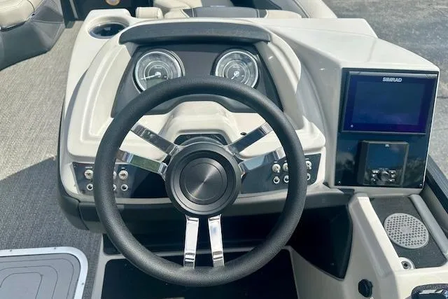 Slide: The Image of Steering console of 2026 Barletta C22M boat with modern controls and display. - 16