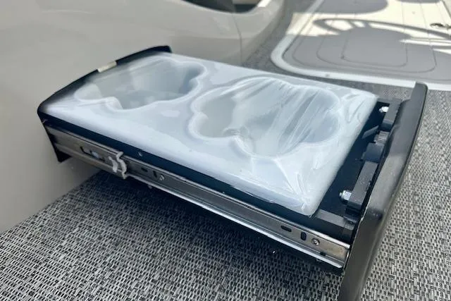 Slide: The Image of Cup holder on a 2026 Barletta C22M boat, featuring a sleek, modern design. - 18