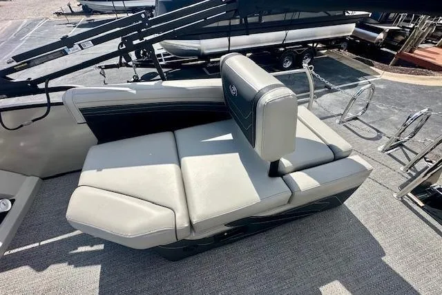 Slide: The Image of 2026 Barletta C22M boat seating area with gray upholstery and adjustable headrest. - 5