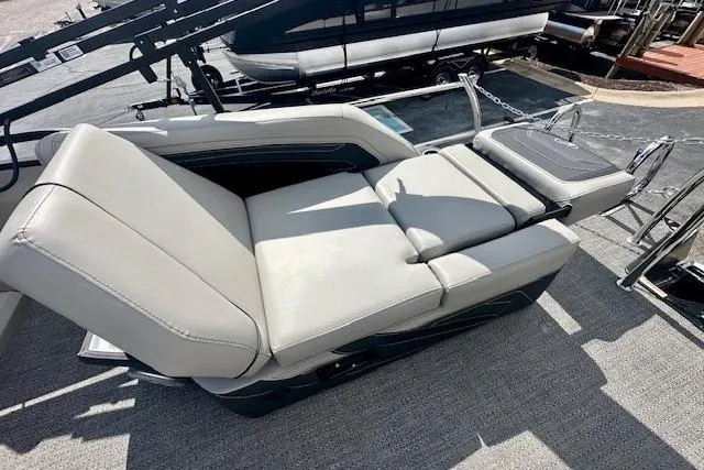 Slide: The Image of 2026 Barletta C22M boat with luxurious beige seating and sleek design. - 7