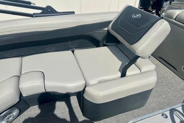 Slide: The Image of 2026 Barletta C22M boat interior with gray seating and adjustable backrest. - 9