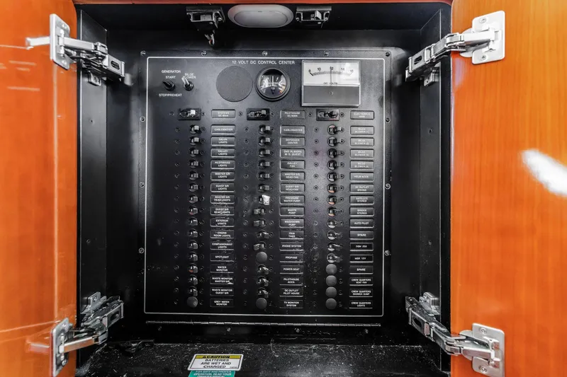 Slide: The Image of Electrical control panel inside a 2004 Carver 570 Voyager Pilothouse yacht. - 23
