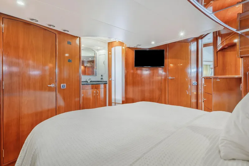 Slide: The Image of Luxurious interior of 2004 Carver 570 Voyager Pilothouse with wood finishes and modern amenities. - 33