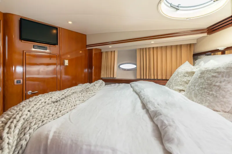 Slide: The Image of Luxurious bedroom interior of 2004 Carver 570 Voyager Pilothouse yacht. - 38