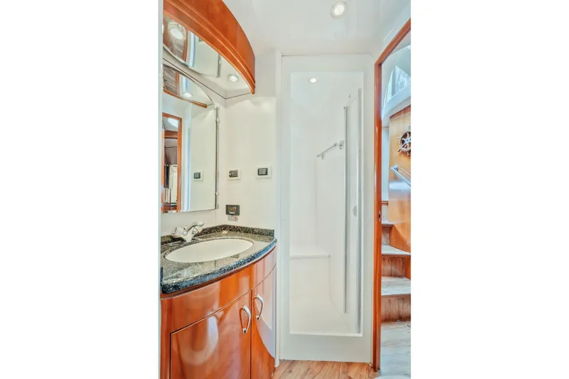 Slide: The Image of Luxurious bathroom in 2004 Carver 570 Voyager Pilothouse yacht with modern fixtures. - 40