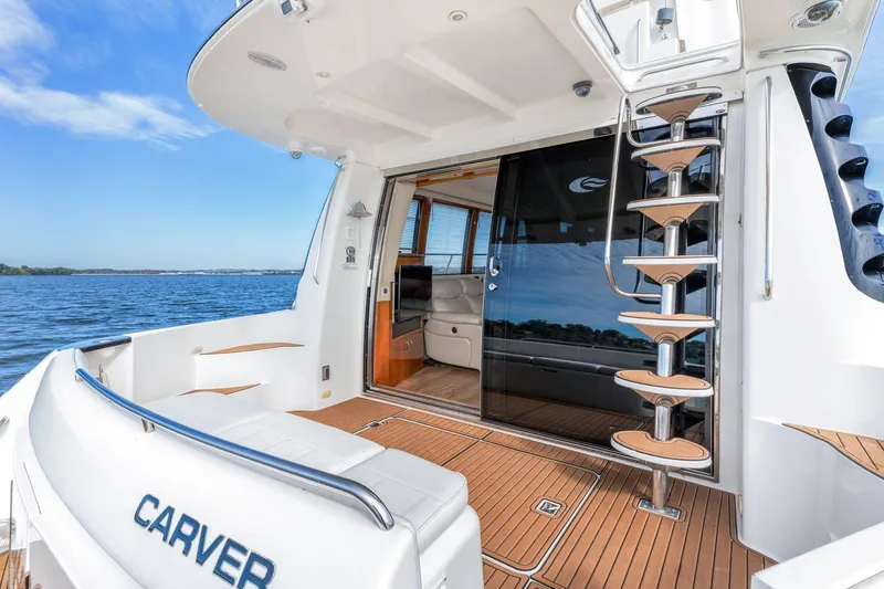 Slide: The Image of 2004 Carver 570 Voyager Pilothouse yacht with elegant deck and modern interior design. - 58