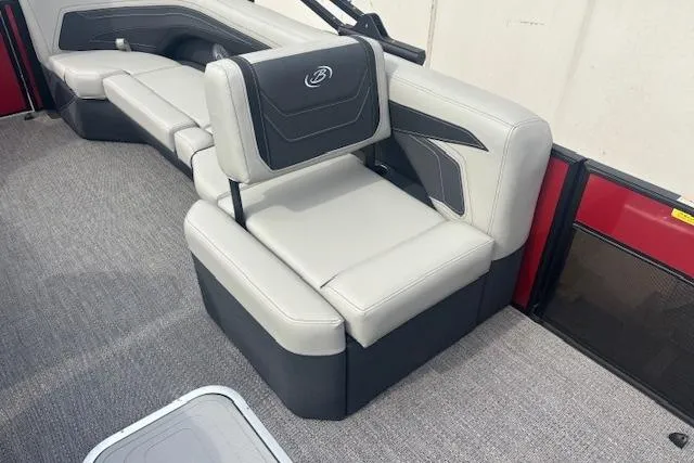 Slide: The Image of 2026 Barletta C24Q boat interior with gray seating and modern design. - 10