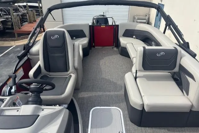 Slide: The Image of 2026 Barletta C24Q pontoon boat interior with luxurious seating and modern design. - 5