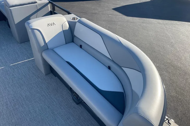 Slide: The Image of 2025 Avalon Venture 2585 VRB boat interior with sleek gray seating and modern design. - 10