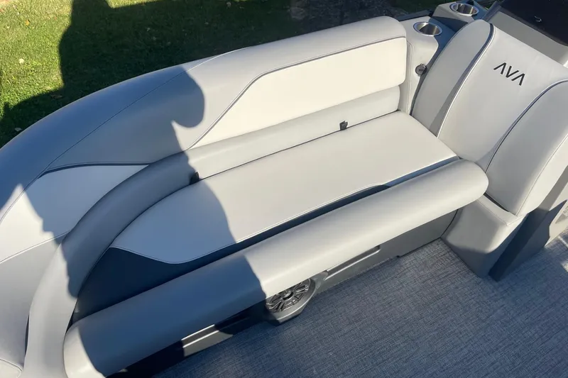Slide: The Image of 2025 Avalon Venture 2585 VRB boat interior seating detail with storage compartment. - 13