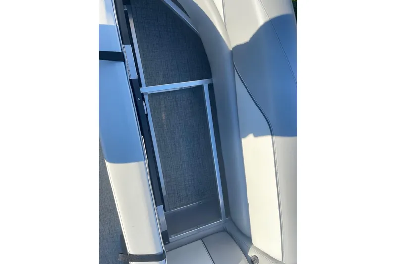 Slide: The Image of 2025 Avalon Venture 2585 VRB boat interior with sleek seating and modern design. - 14