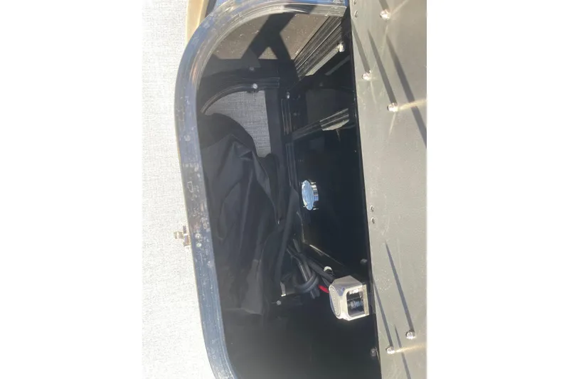 Slide: The Image of 2025 Avalon Venture 2585 VRB interior with cup holders and seating area. - 39