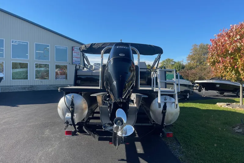 Slide: The Image of 2025 Avalon Venture 2585 VRB pontoon boat with spacious seating and modern design. - 6