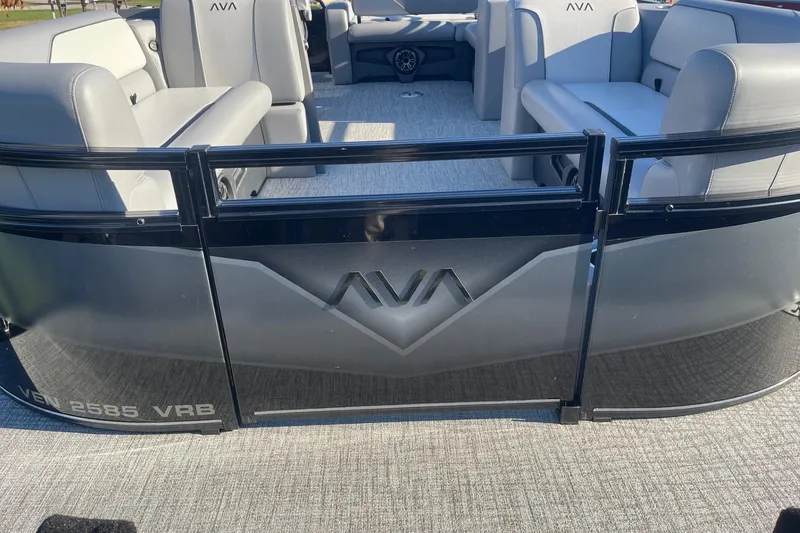 Slide: The Image of 2025 Avalon Venture 2585 VRB pontoon boat with spacious seating and sleek design. - 8
