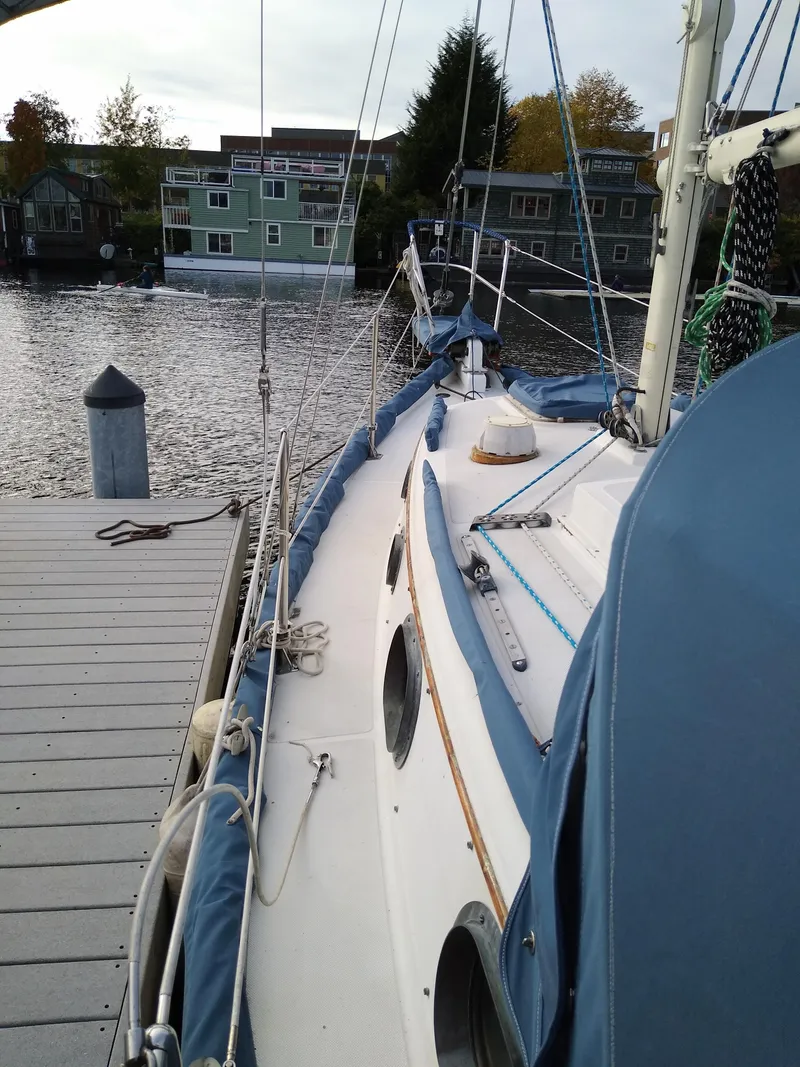 Slide: The Image of 1988 Pacific Seacraft Dana 24 sailboat docked. - 10