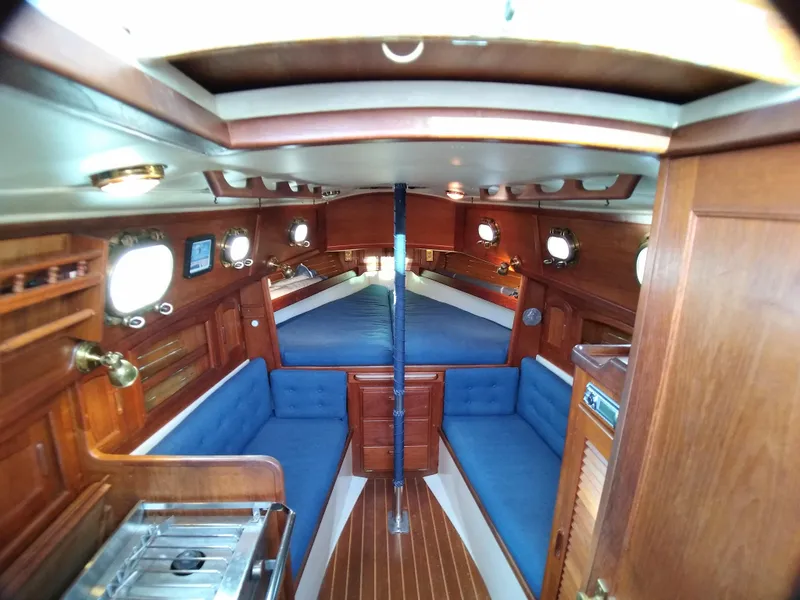 Slide: The Image of Interior of a 1988 Pacific Seacraft Dana 24 yacht with wooden finish. - 18