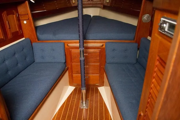 Slide: The Image of Interior of a 1988 Pacific Seacraft Dana 24 with blue upholstery. - 20