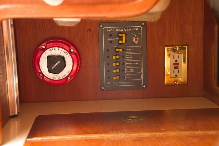 Slide: The Image of Interior of 1988 Pacific Seacraft Dana 24 with control panel and outlet. - 30