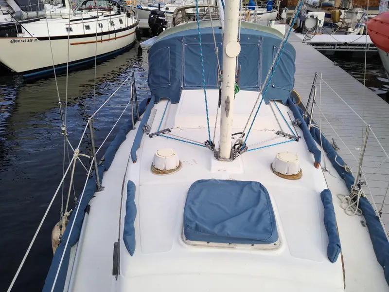 Slide: The Image of 1988 Pacific Seacraft Dana 24 sailboat docked in marina. - 6