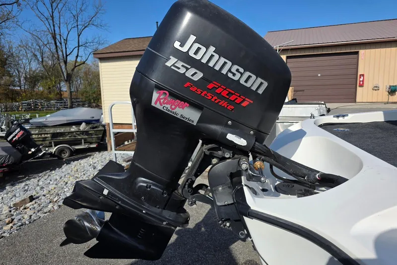 Slide: The Image of 1997 Ranger 462VS boat with Johnson 150 Faststrike outboard motor. - 4